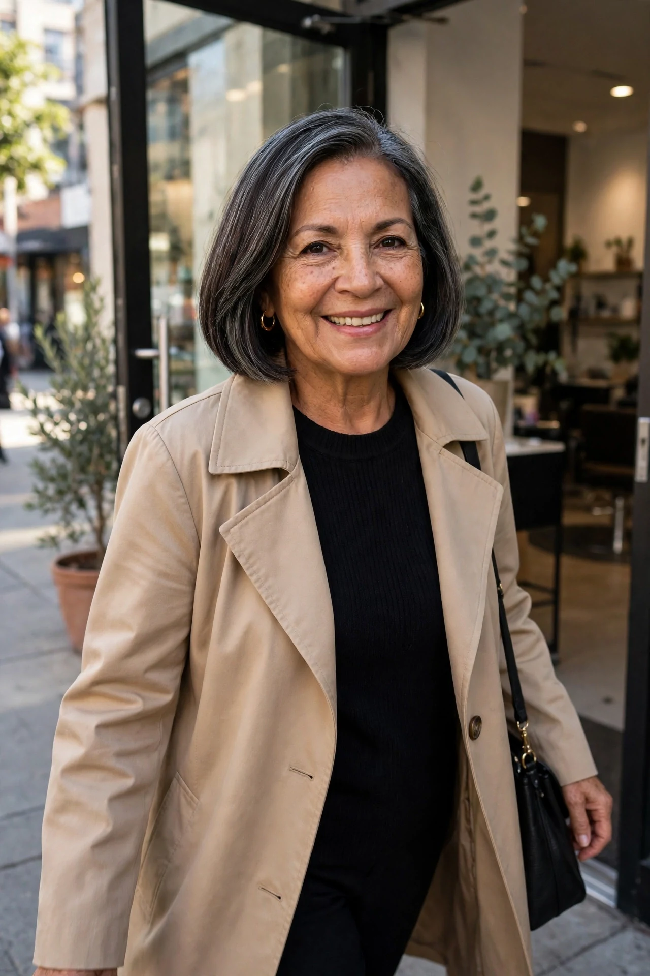 woman in her 60s with a fresh italian bob leaving the salon