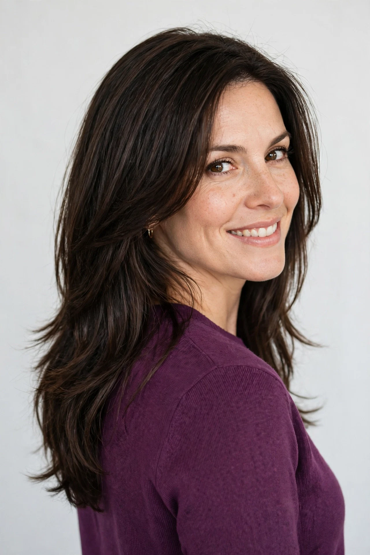 Long layered hair past the shoulders after growing out a bob